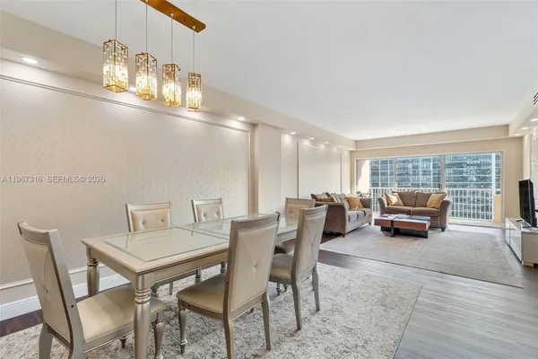 a view of a dining room with furniture
