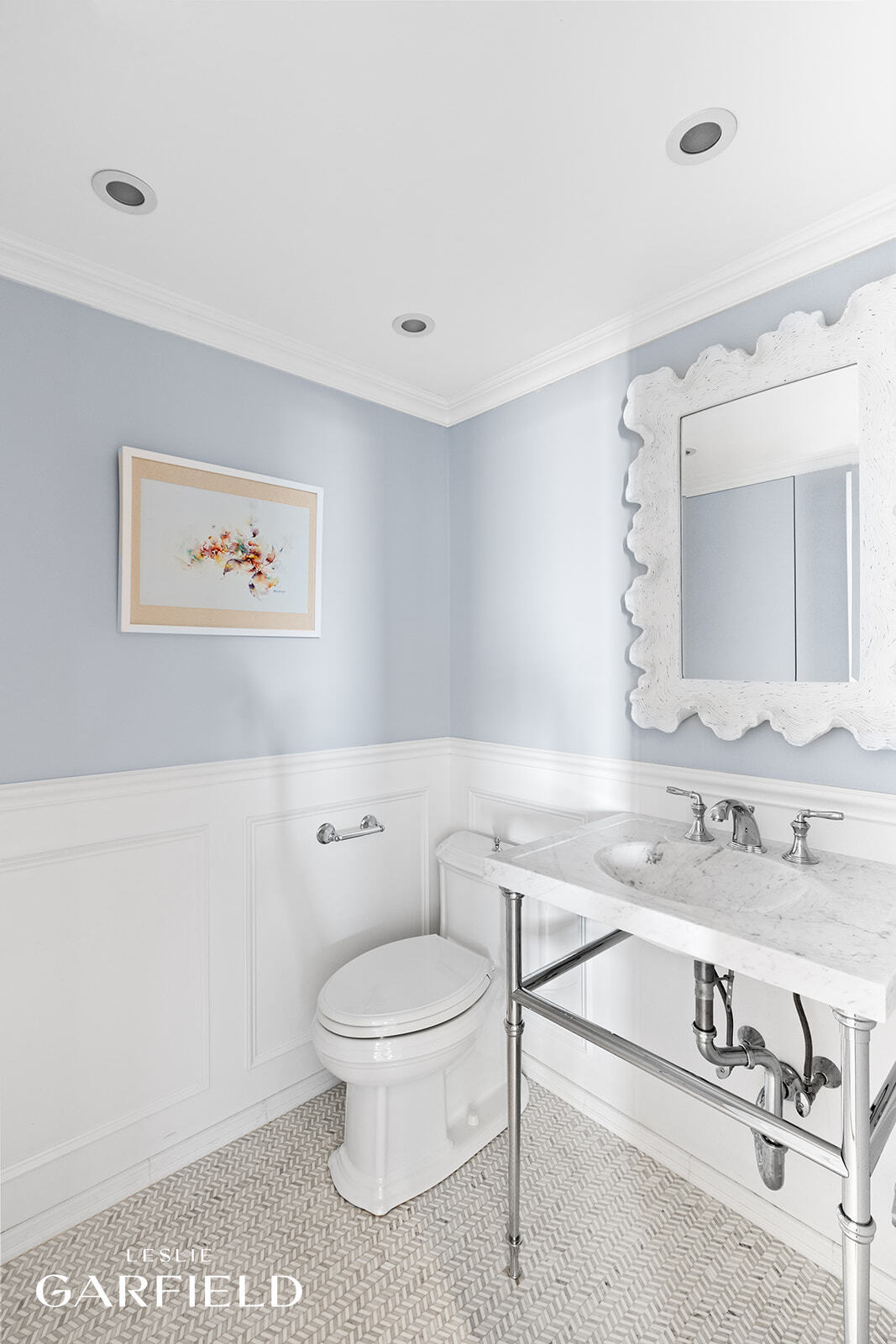 400 East 70th Street, Unit 3602 Manhattan, NY 10021 - Photo 11 of 21 a bathroom with a toilet a sink and mirror