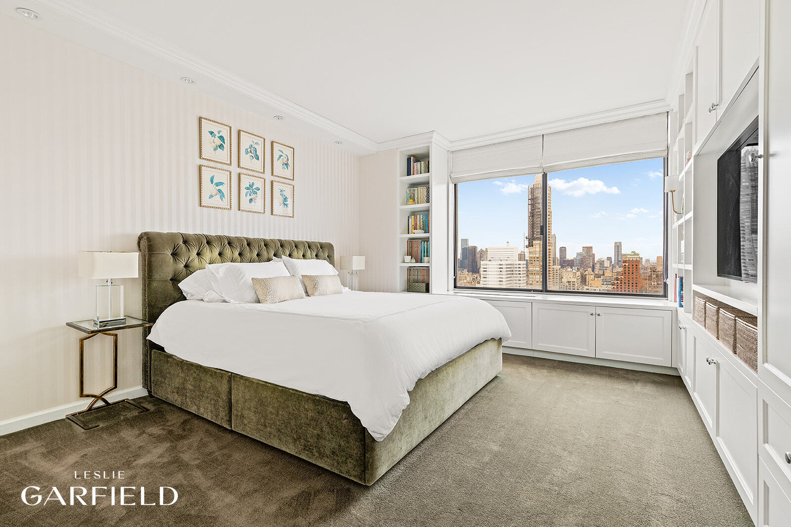 400 East 70th Street, Unit 3602 Manhattan, NY 10021 - Photo 14 of 21 a spacious bedroom with a large bed and a large window