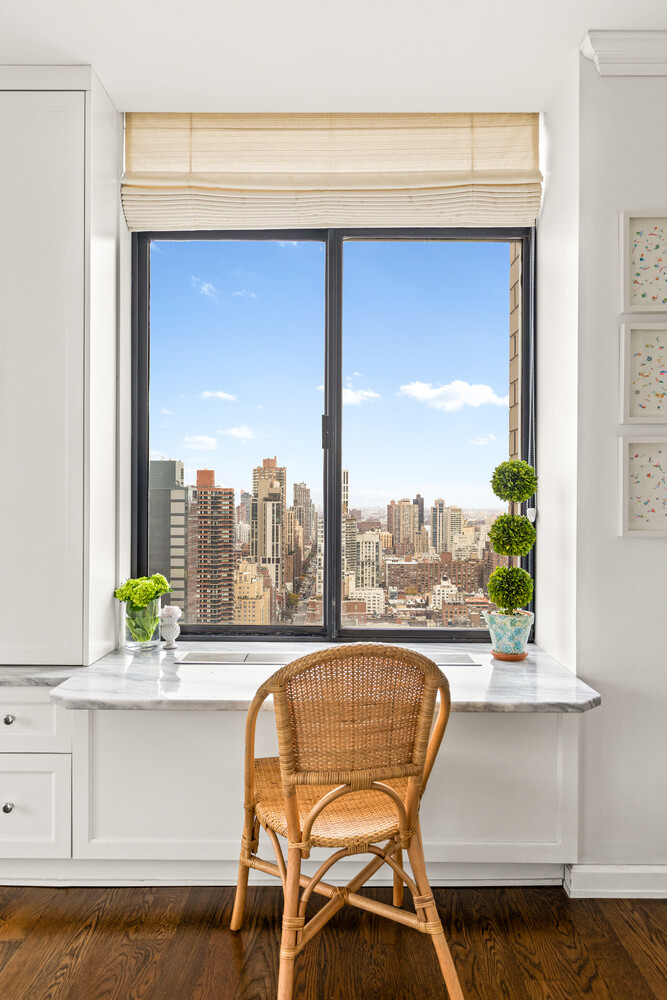 400 East 70th Street, Unit 3602 Manhattan, NY 10021 - Photo 20 of 20 a view of a swimming pool with a lounge chair