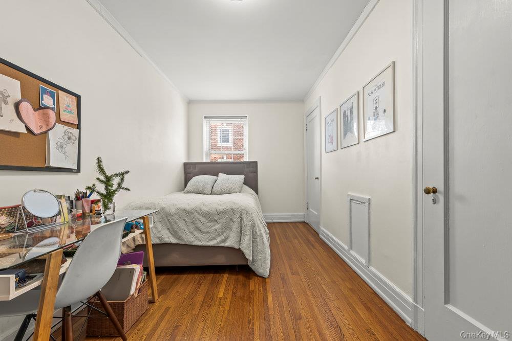 3 Alden Place, Unit 3A Bronxville, NY 10708 - Photo 14 of 22 a bedroom with a bed and wooden floor