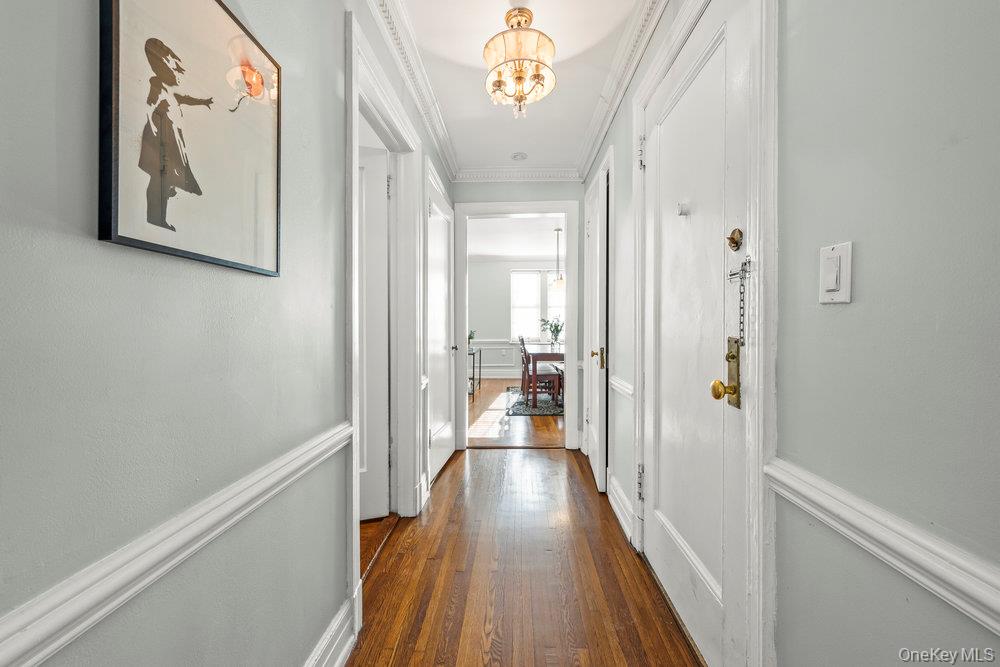 3 Alden Place, Unit 3A Bronxville, NY 10708 - Photo 9 of 22 a view of a hallway with wooden floor and staircase