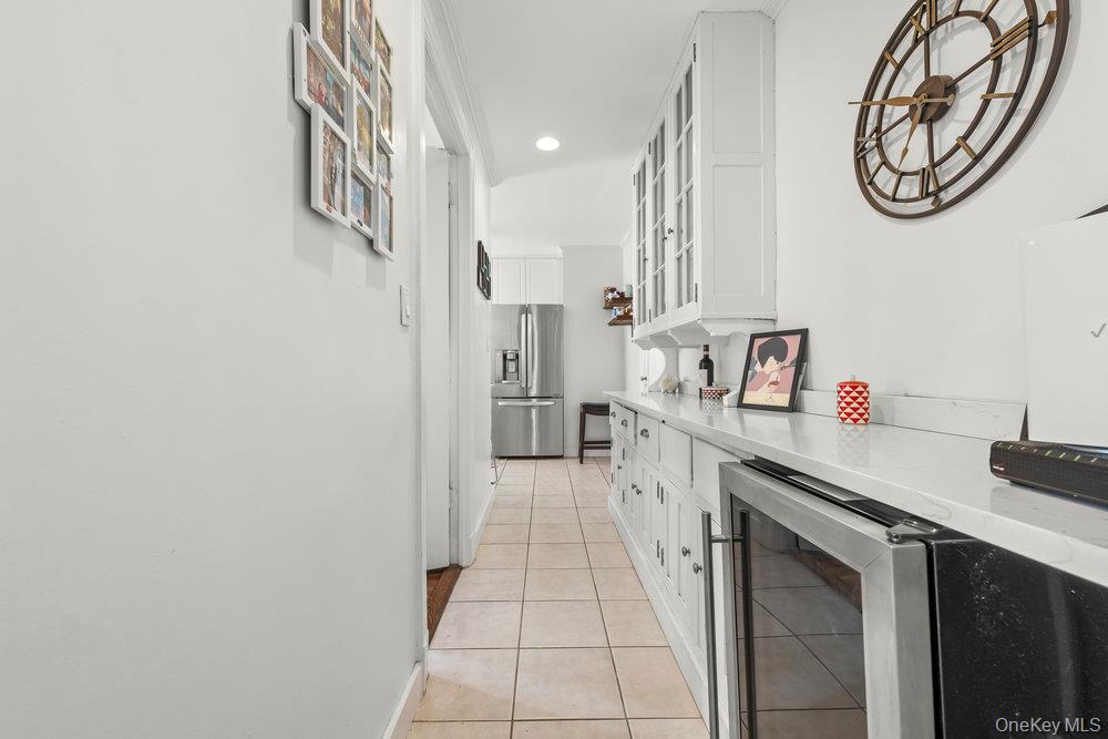 3 Alden Place, Unit 3A Bronxville, NY 10708 - Photo 10 of 22 a kitchen with a refrigerator and a stove