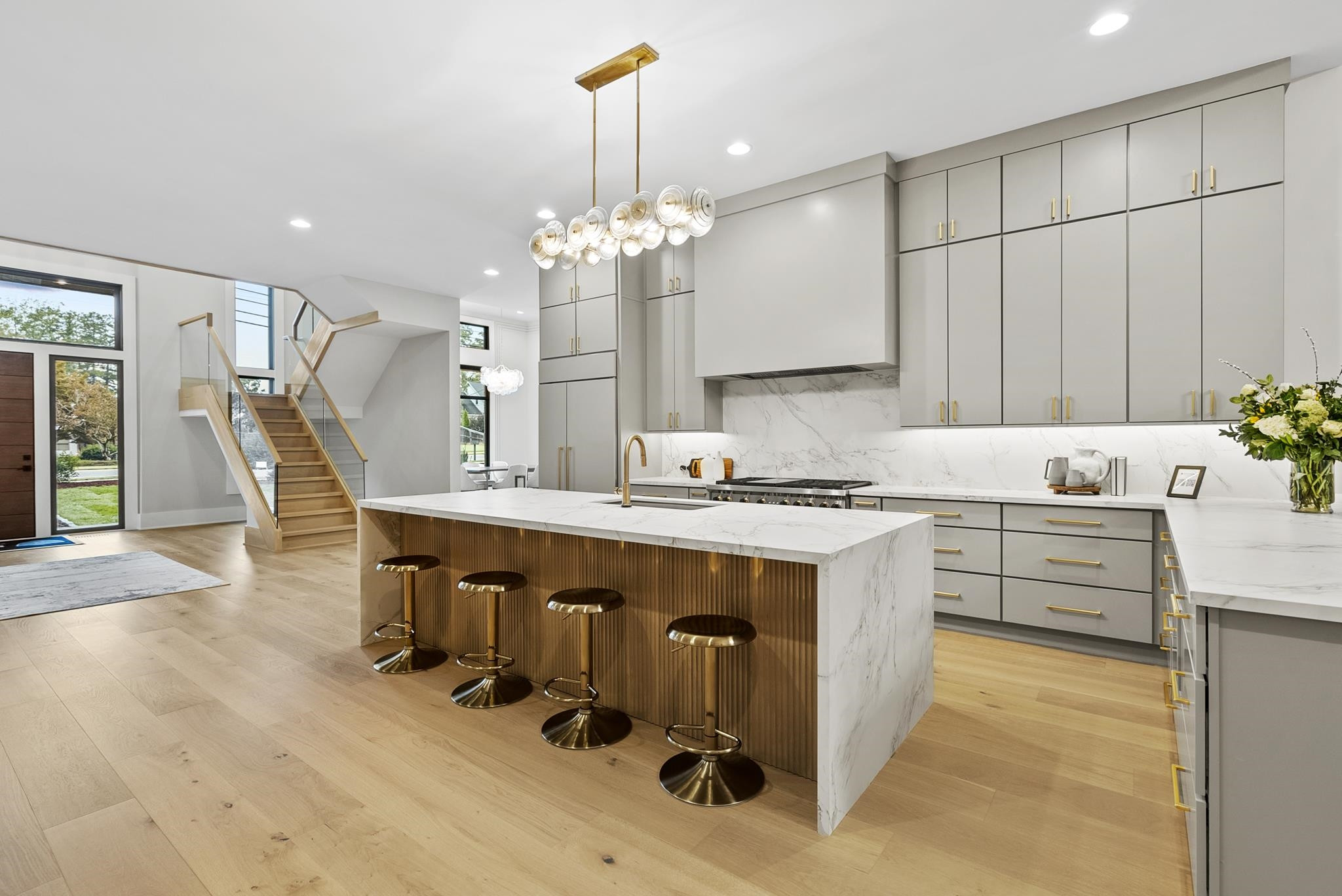 2116 Ridge Road Raleigh, NC 27607 - Photo 13 of 22 a very nice looking kitchen with granite countertop a stove a sink a dining table and chairs