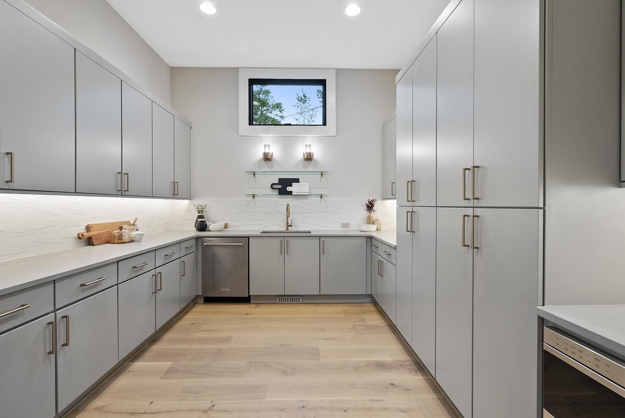 2116 Ridge Road Raleigh, NC 27607 - Photo 17 of 22 a large kitchen with a refrigerator a sink and dishwasher
