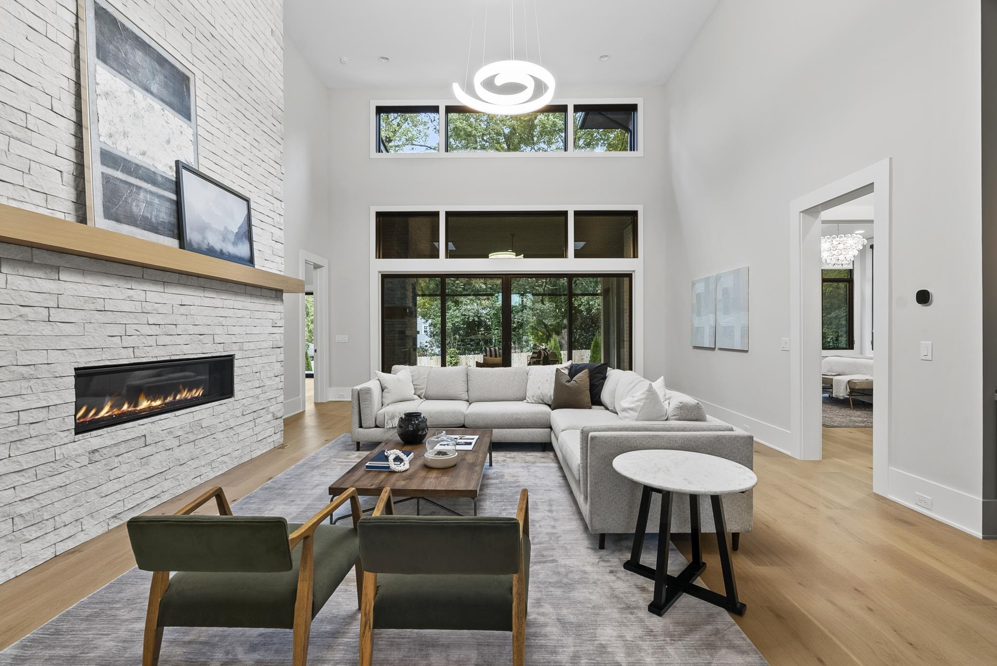 2116 Ridge Road Raleigh, NC 27607 - Photo 19 of 22 a living room with furniture a table and a fireplace