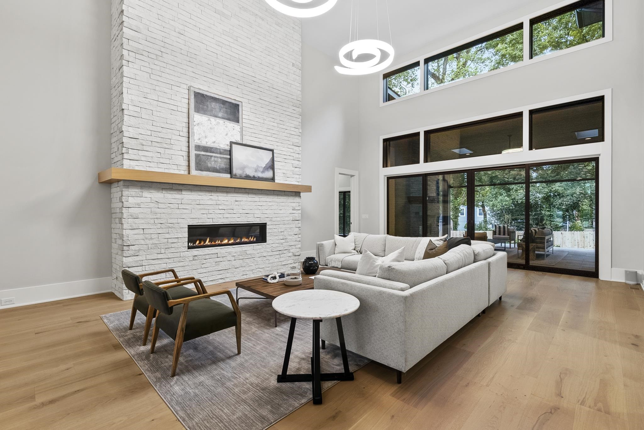 2116 Ridge Road Raleigh, NC 27607 - Photo 20 of 22 a living room with furniture and a fireplace