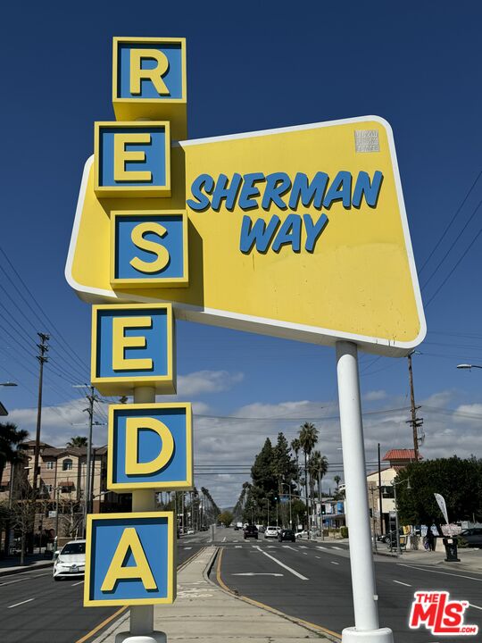 19355 Sherman Way, Unit 37 Reseda, CA 91335 - Photo 12 of 12 a street sign on a pole