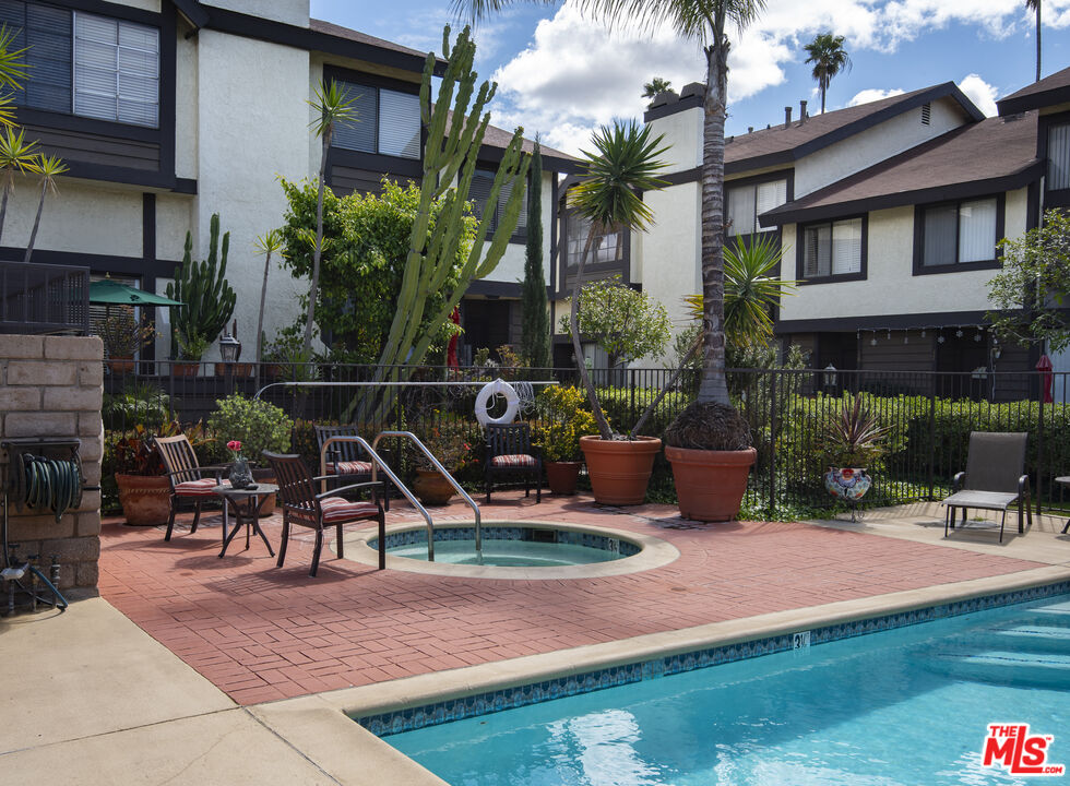 19355 Sherman Way, Unit 37 Reseda, CA 91335 - Photo 10 of 12 a view of a backyard with sitting area and furniture