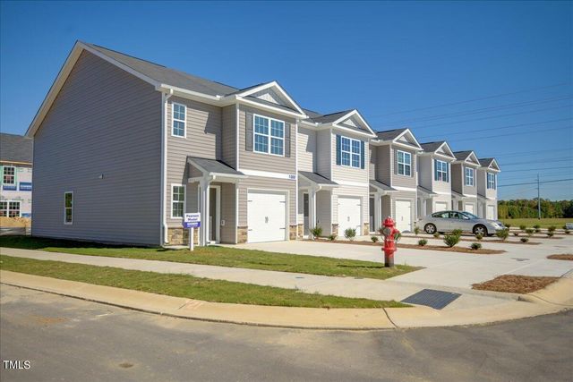 a view of a building with a swimming pool