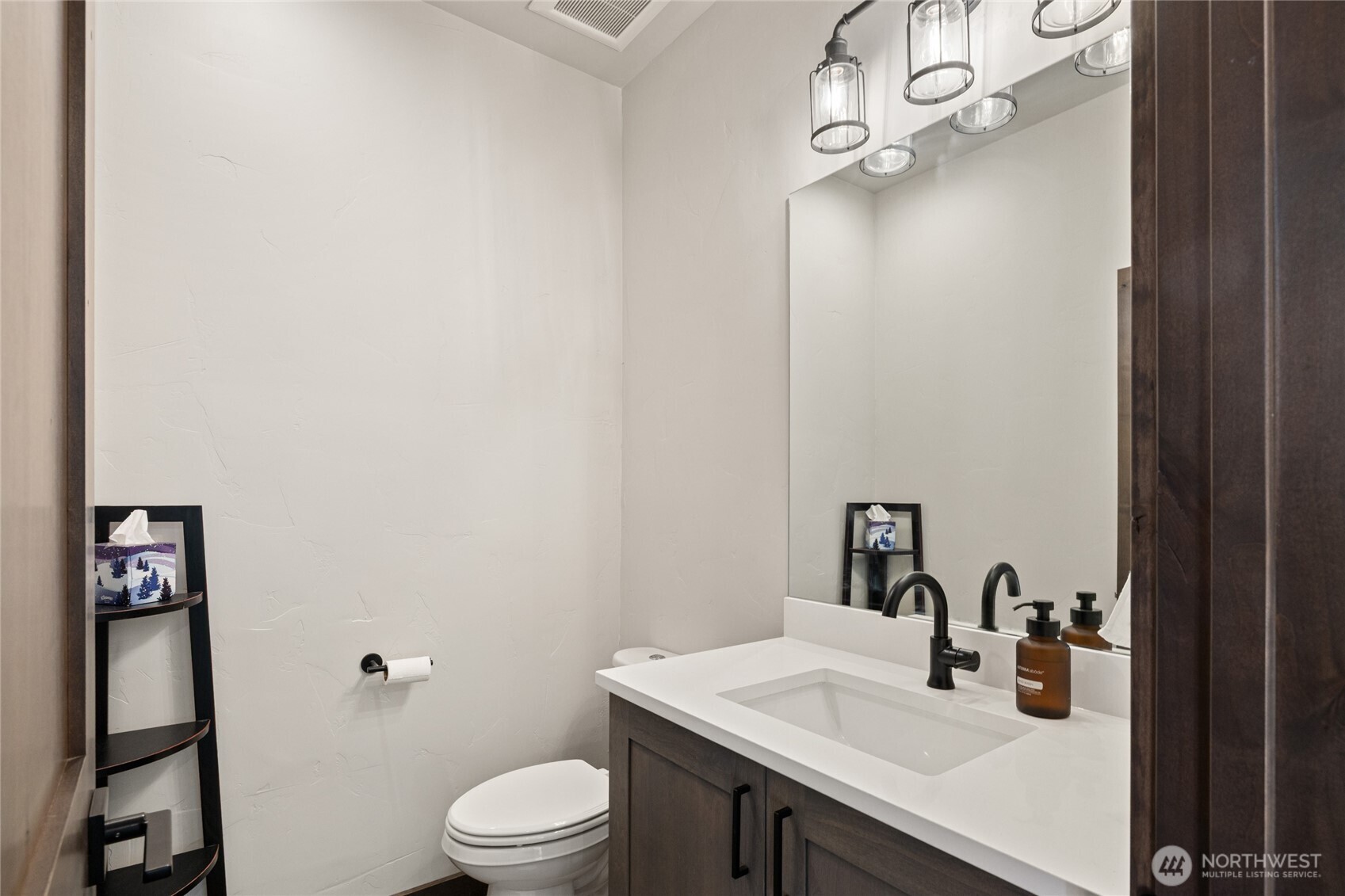 120 Owl Ridge Drive Cle Elum, WA 98922 - Photo 23 of 34 a bathroom with a sink vanity mirror and toilet