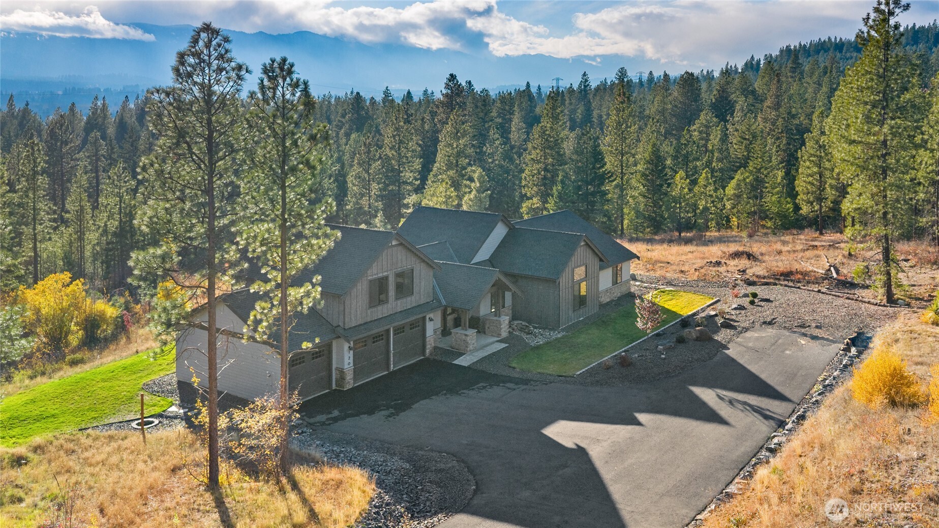 120 Owl Ridge Drive Cle Elum, WA 98922 - Photo 28 of 34 a view of a house with a yard and sitting area
