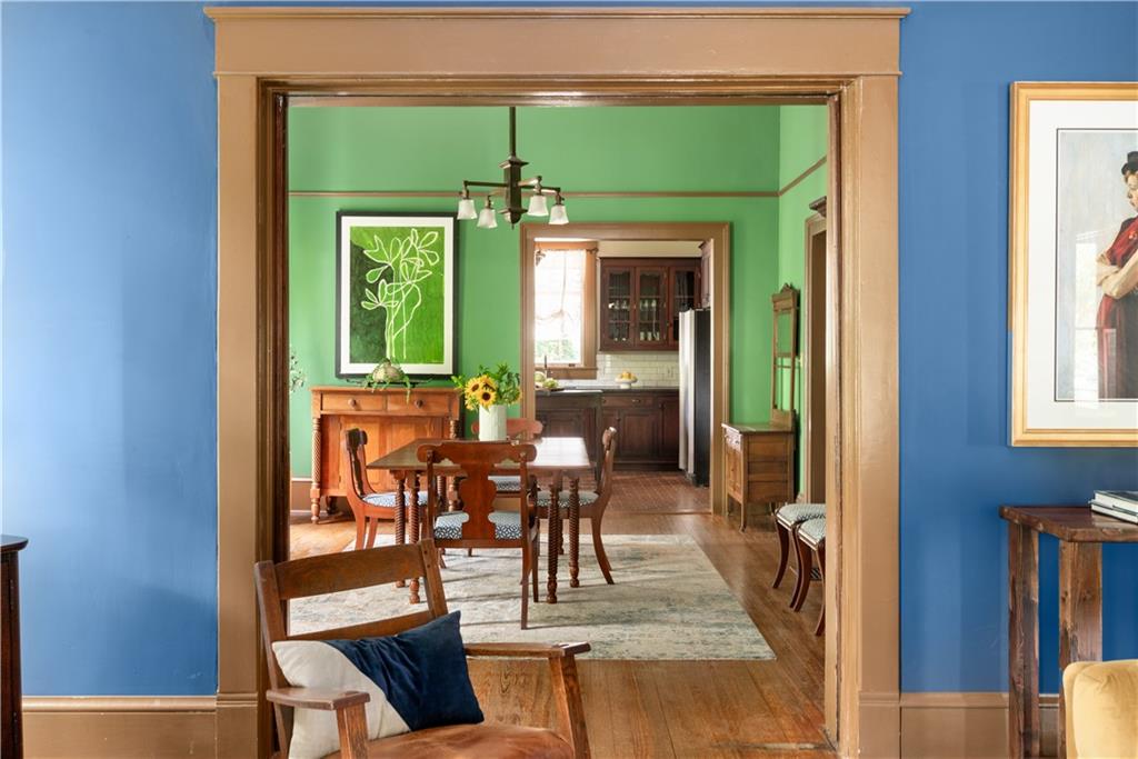 70 Kirkwood Road Northeast, Unit MH Atlanta, GA 30317 - Photo 15 of 36 a view of a dining room with furniture window and outside view