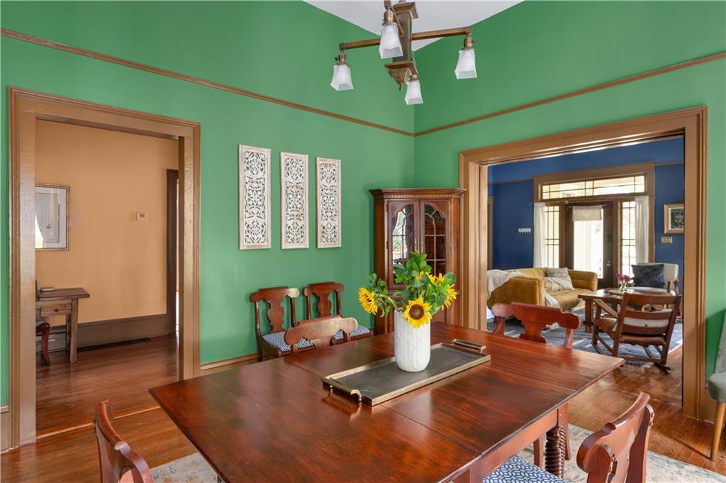 70 Kirkwood Road Northeast, Unit MH Atlanta, GA 30317 - Photo 2 of 36 a living room with furniture flowerpot and a chandelier