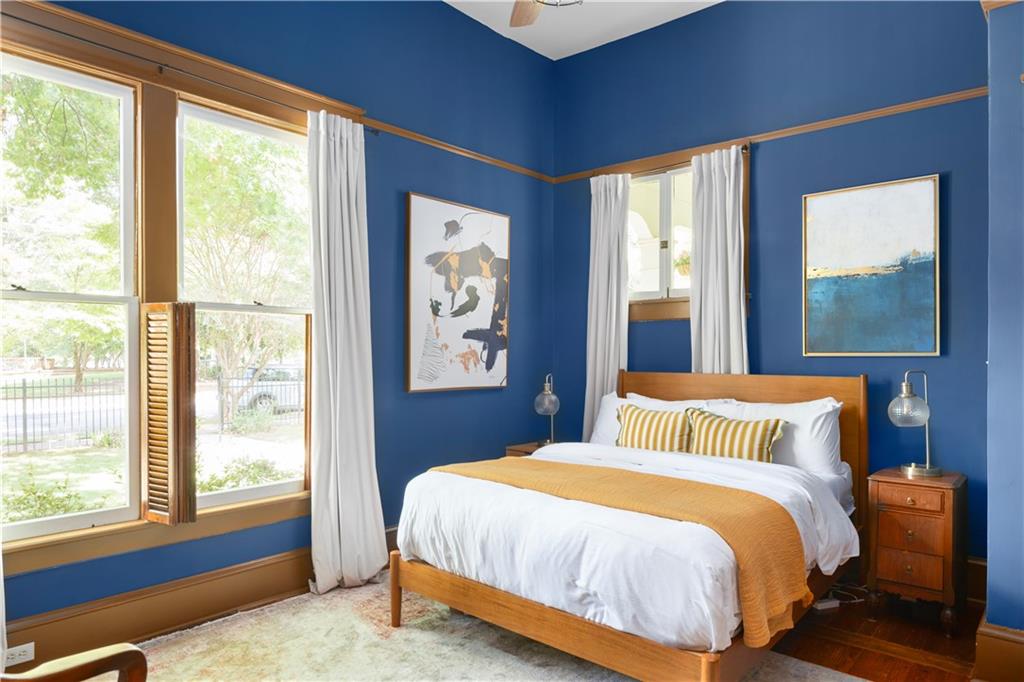 70 Kirkwood Road Northeast, Unit MH Atlanta, GA 30317 - Photo 23 of 36 a bedroom with a bed and a window