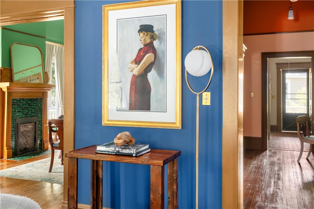 70 Kirkwood Road Northeast, Unit MH Atlanta, GA 30317 - Photo 27 of 36 a front view of a house with a dining table and chairs