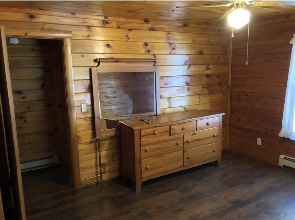 769 N Road Hardwick, MA 01037 - Photo 17 of 25 a room with cabinets and a fireplace