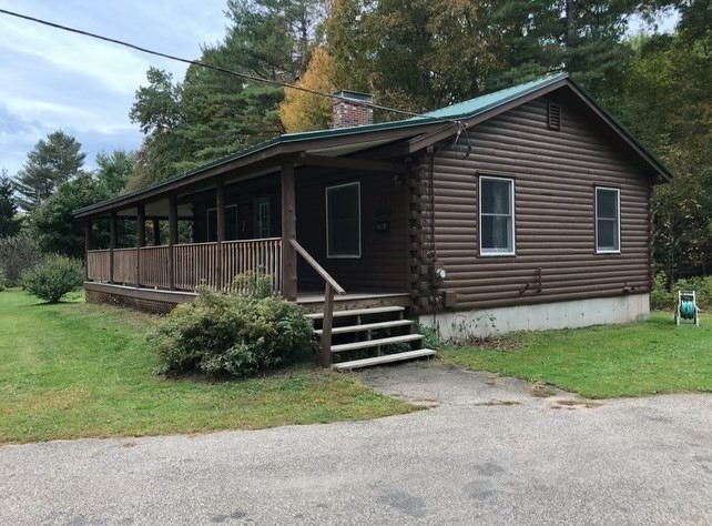 769 N Road Hardwick, MA 01037 - Photo 4 of 25 a front view of a house with a garden