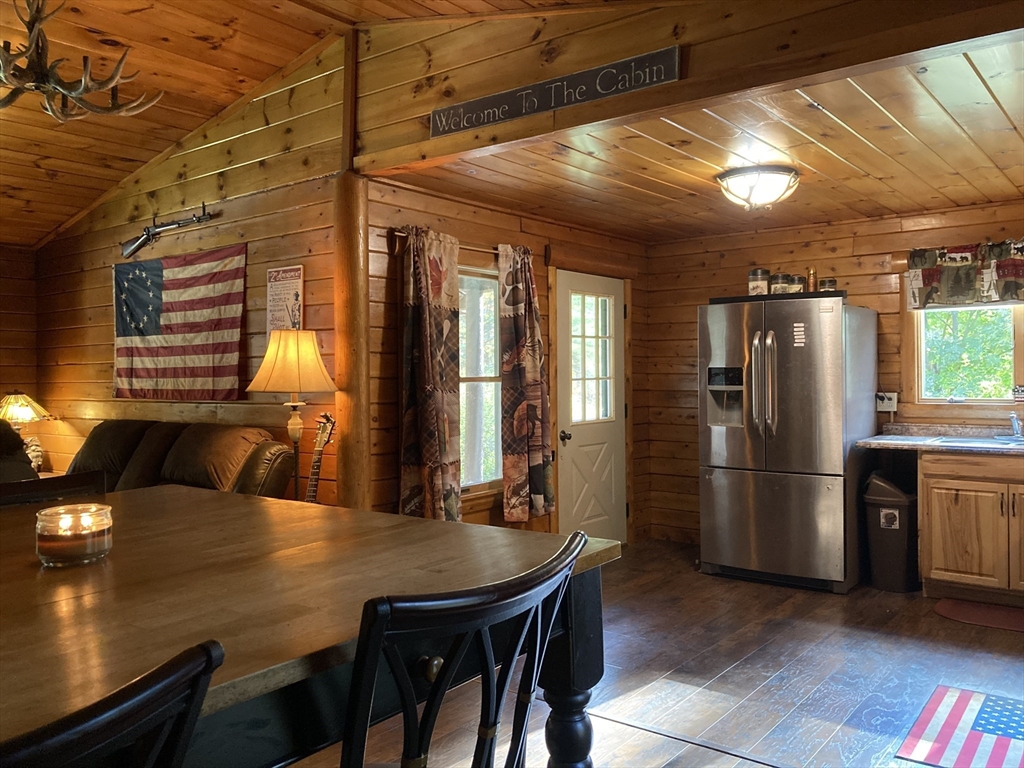 769 N Road Hardwick, MA 01037 - Photo 10 of 25 a kitchen with refrigerator and furniture