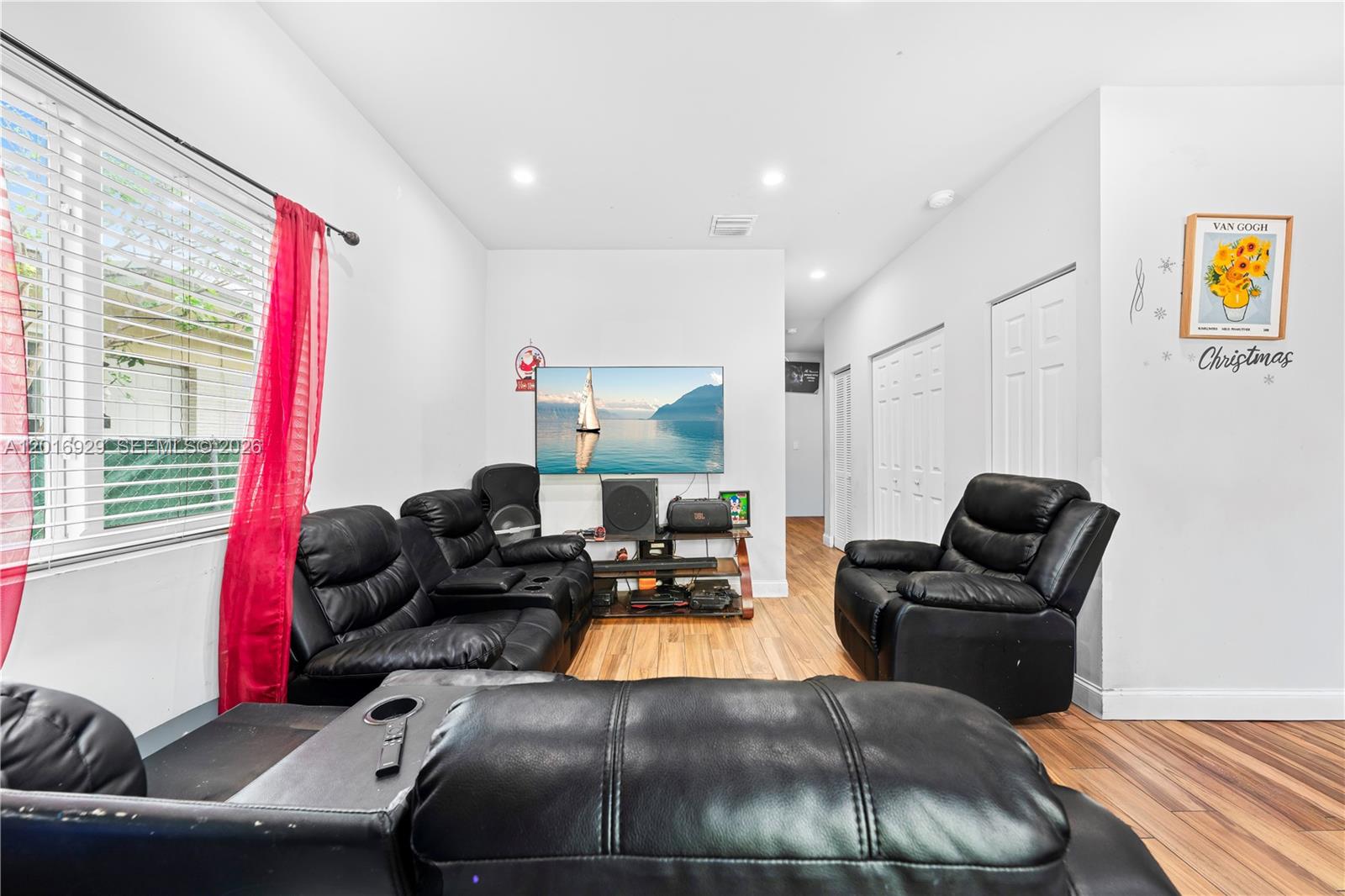 4721 Northwest 15th Court, Unit 1 Miami, FL 33142 - Photo 10 of 11 a living room with furniture
