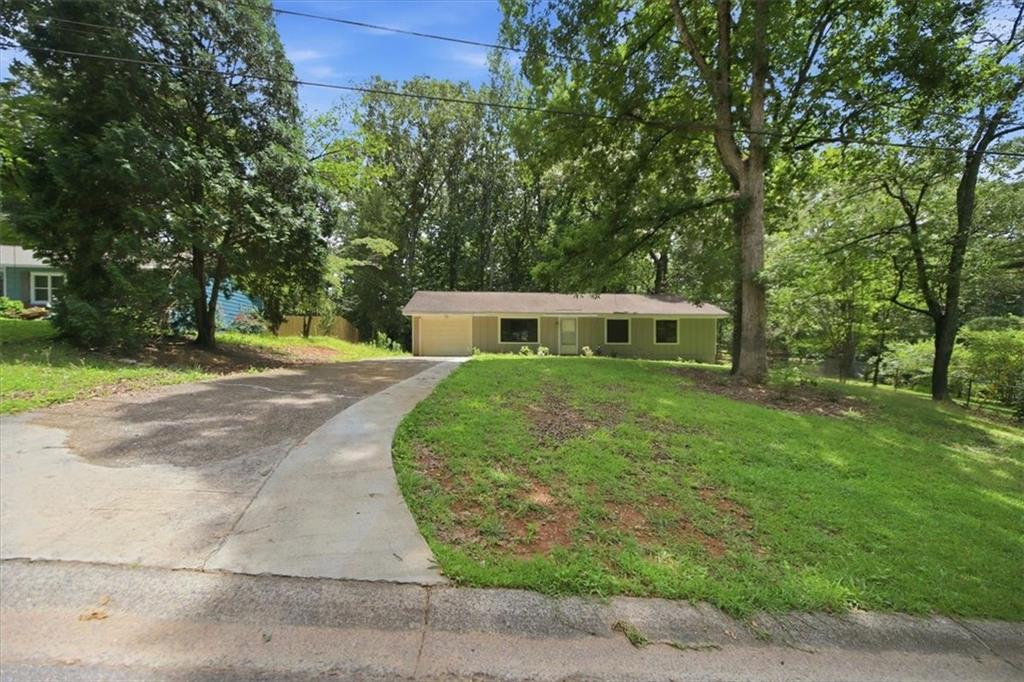 142 Deer Run Canton, GA 30114 - Photo 2 of 24 a house view with a outdoor space