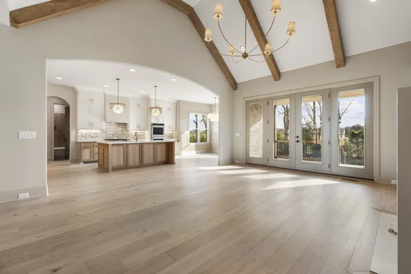 a kitchen with stainless steel appliances granite countertop a stove microwave and oven