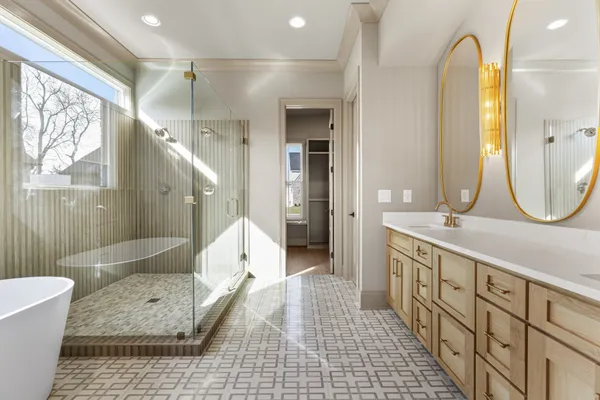 an empty room with closet and a bathroom