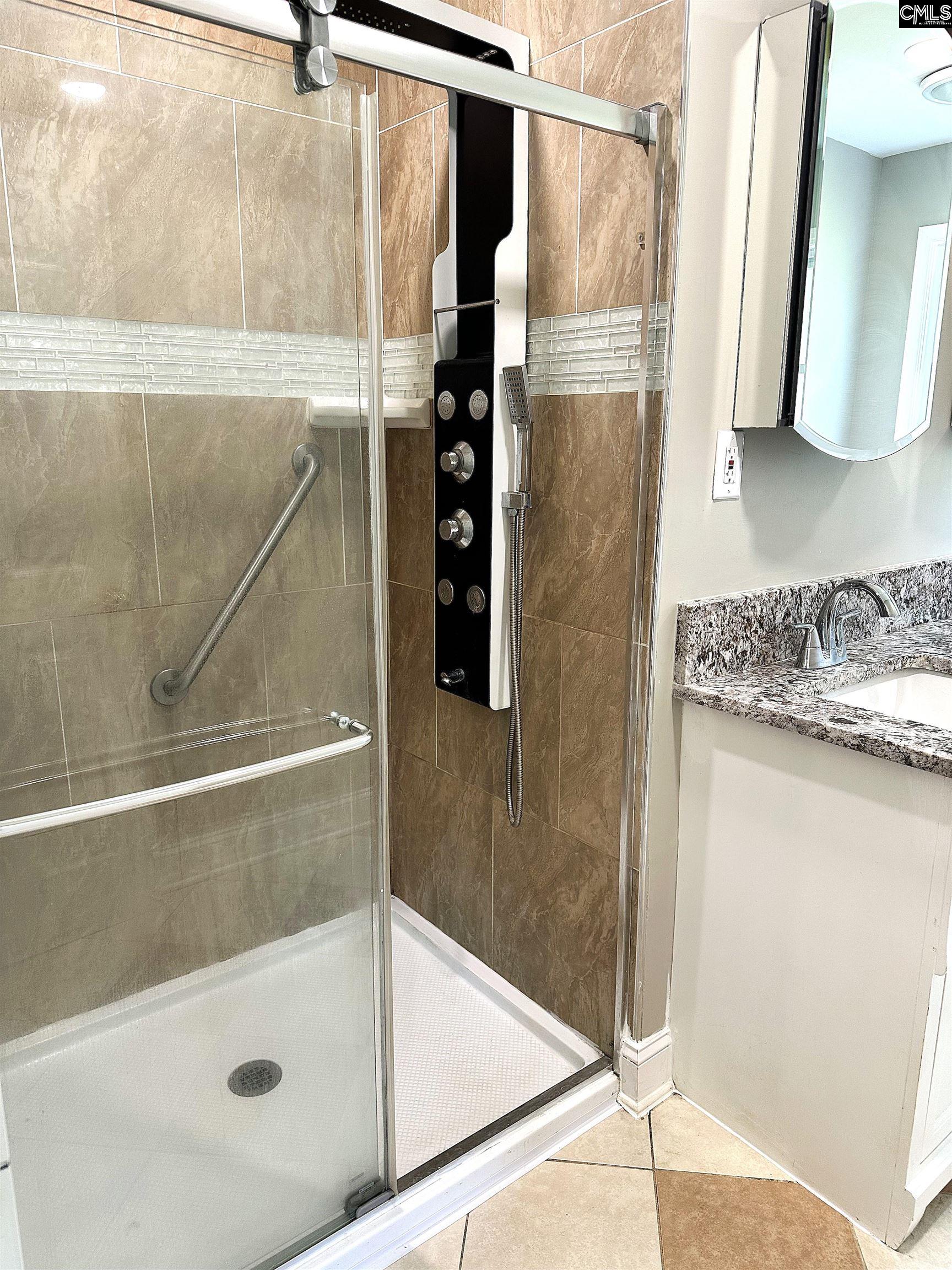 535 Sandbar Road Chapin, SC 29036 - Photo 18 of 23 a bathroom with a shower and a sink