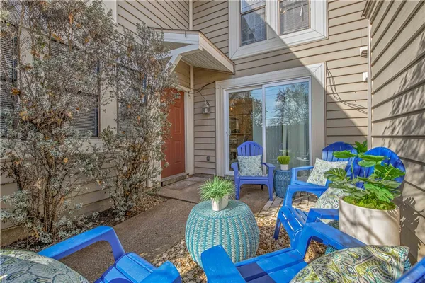 a front view of house with outdoor seating