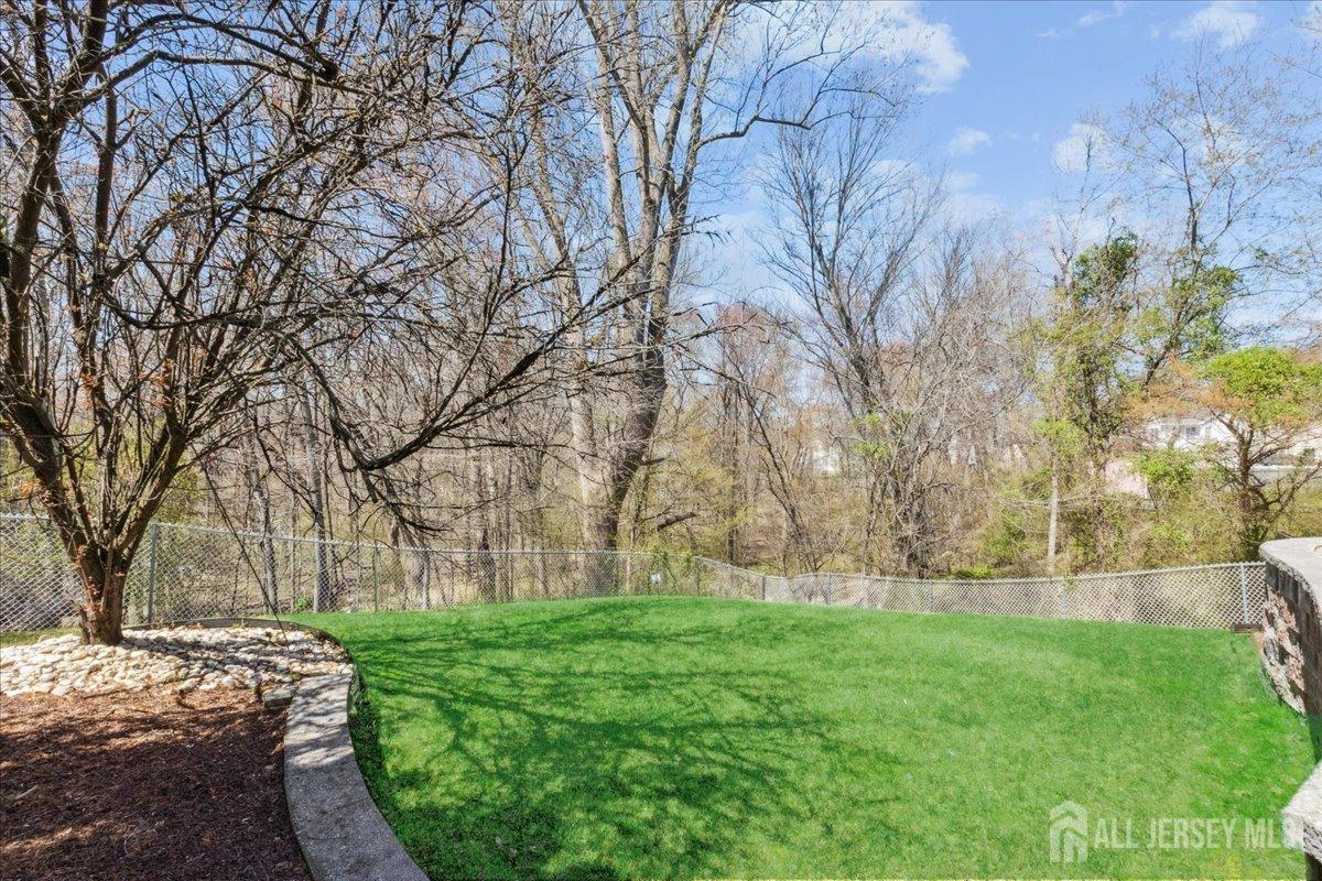 34 Crescent Road Old Bridge, NJ 08857 - Photo 29 of 34 a view of backyard with green space