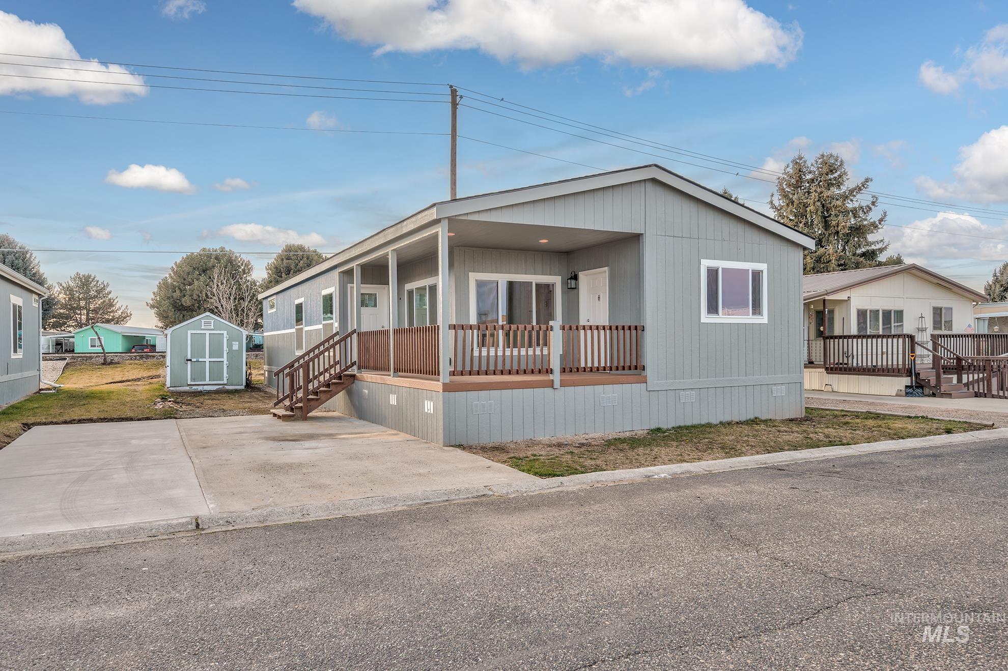 2750 Alden Road, Unit 8 8 Fruitland, ID 83619 - Photo 31 of 31 Manufactured / mobile home with a shed and a porch