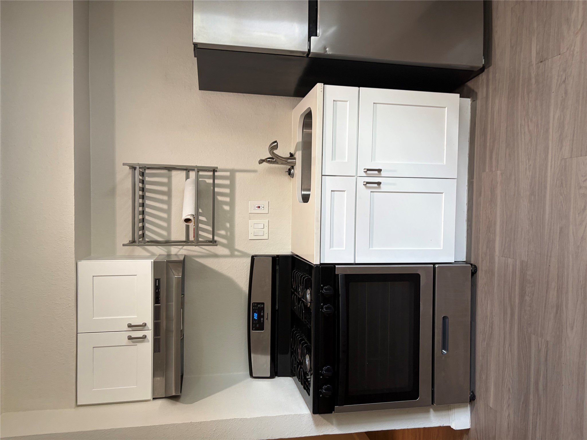 4501 Speedway, Unit 101 Austin, TX 78751 - Photo 1 of 7 A compact kitchen with sleek appliances and abundant cabinetry awaits your culinary creativity.