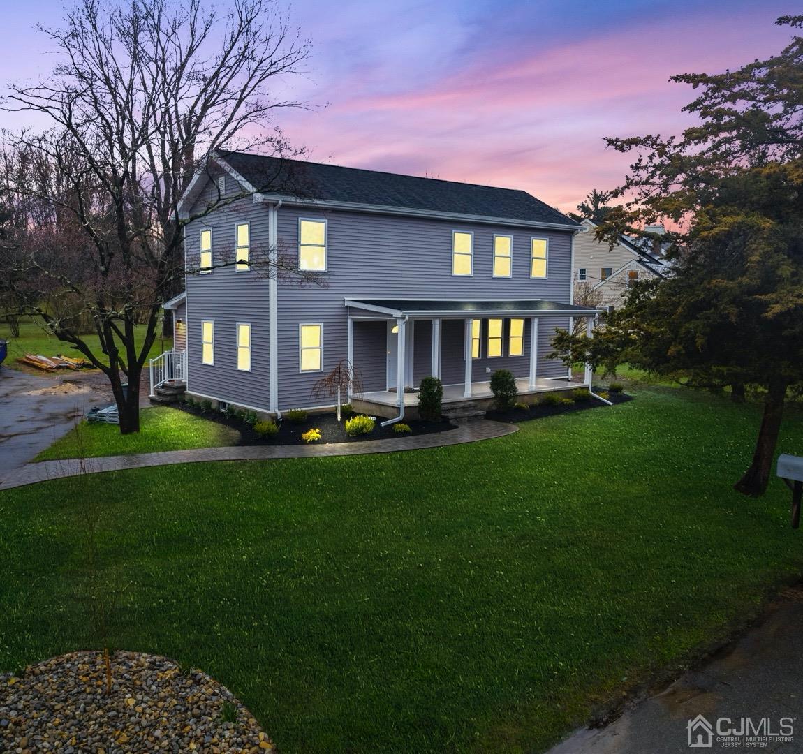 20 Old Ridge Road Monmouth Junction, NJ 08852 - Photo 1 of 26 a front view of a house with a yard