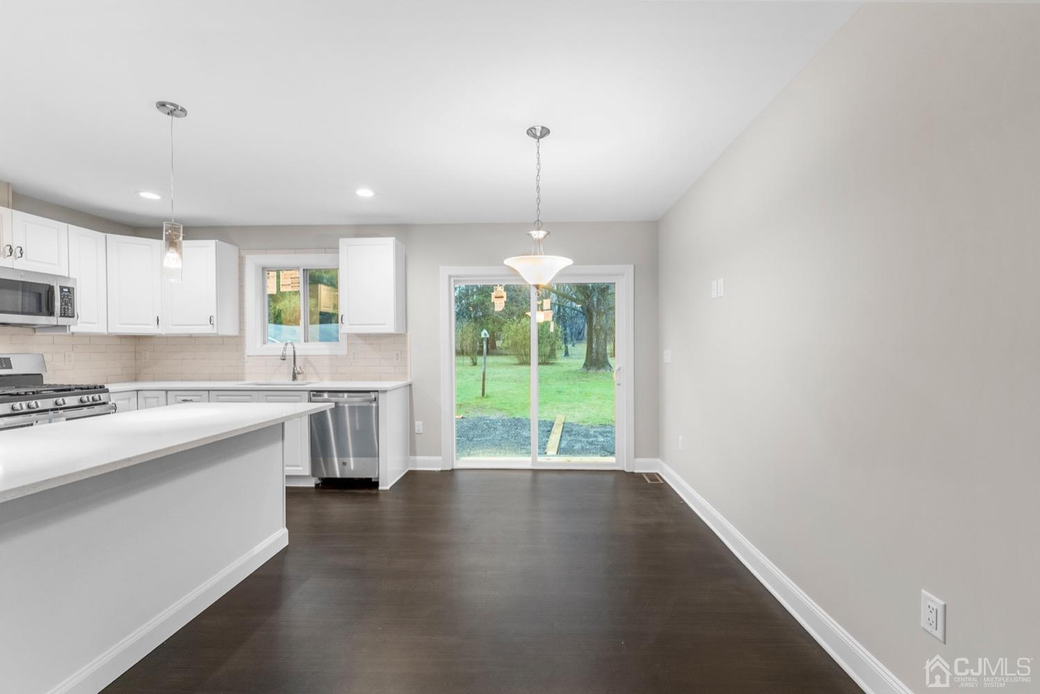 20 Old Ridge Road Monmouth Junction, NJ 08852 - Photo 15 of 26 a kitchen with a large window appliances and cabinets