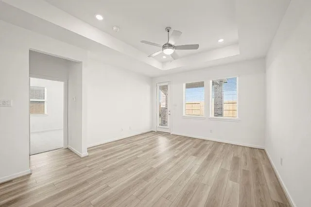 a view of kitchen with wooden floor