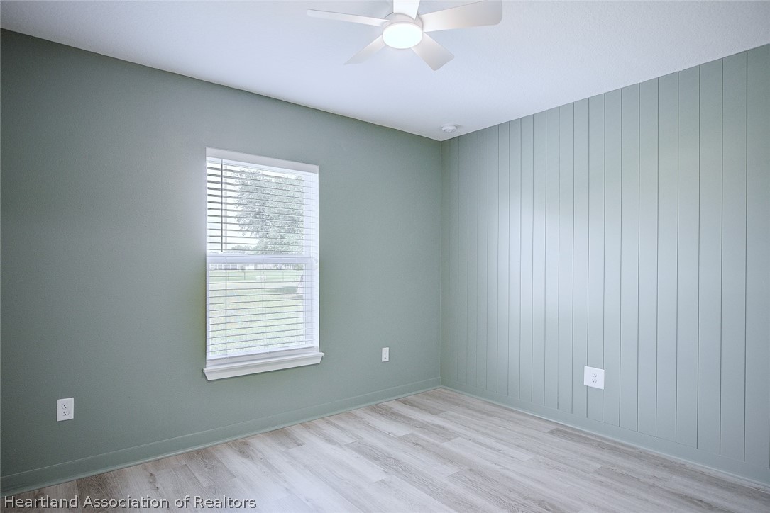 111 Vale Court Sebring, FL 33876 - Photo 28 of 40 a view of an empty room with a window