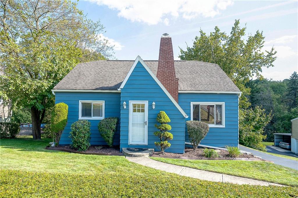 31 Diebold Road McKees Rocks, PA 15136 - Photo 1 of 25 a front view of house with yard outdoor seating and barbeque oven