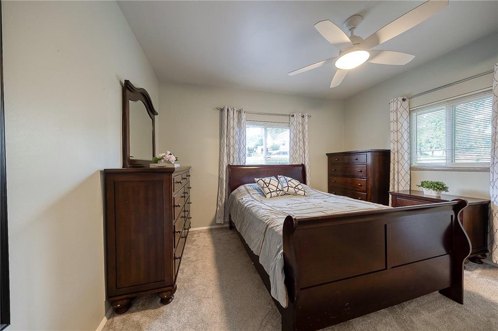 31 Diebold Road McKees Rocks, PA 15136 - Photo 14 of 25 a bedroom with a bed and a flat screen tv