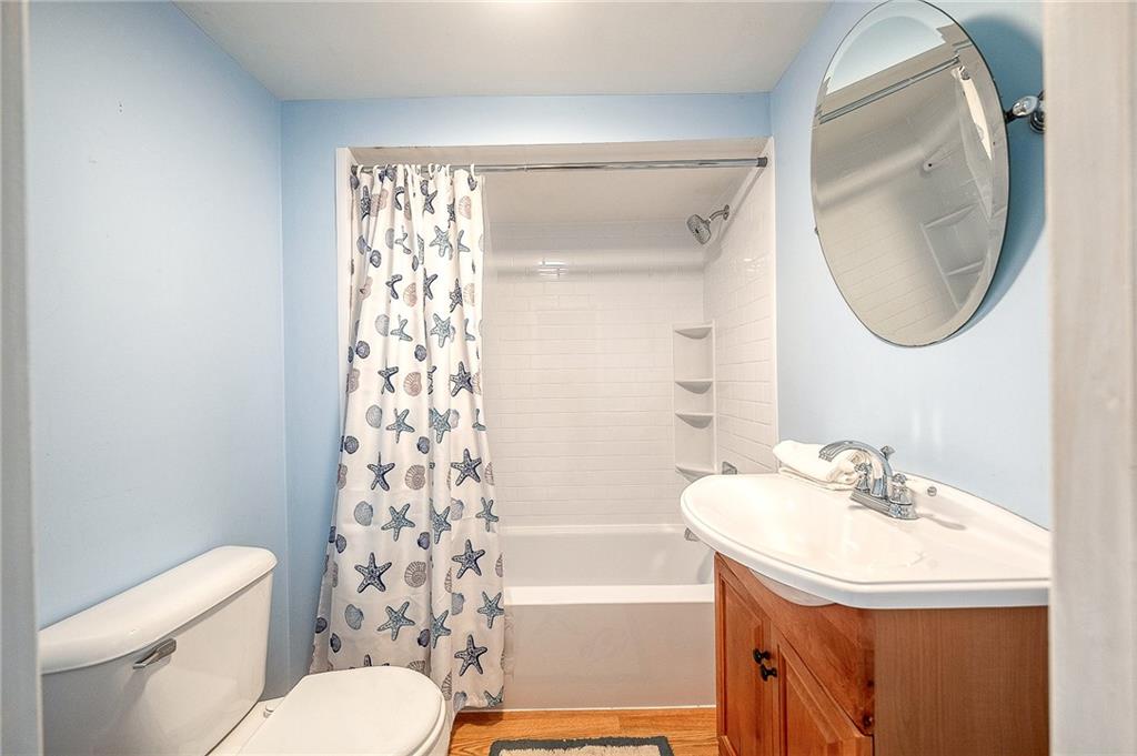 31 Diebold Road McKees Rocks, PA 15136 - Photo 19 of 25 a bathroom with a sink a toilet and a mirror