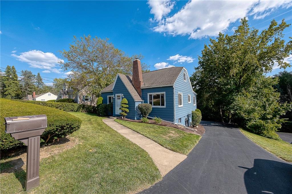 31 Diebold Road McKees Rocks, PA 15136 - Photo 2 of 25 a front view of a house with a yard