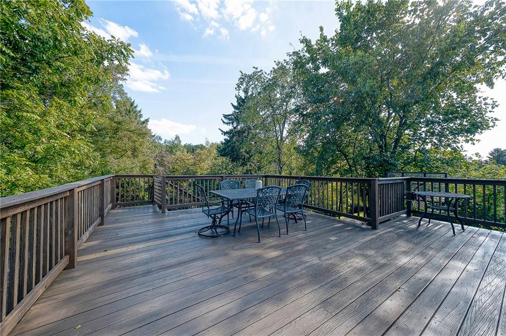 31 Diebold Road McKees Rocks, PA 15136 - Photo 23 of 25 a view of a deck with table and chairs and wooden floor