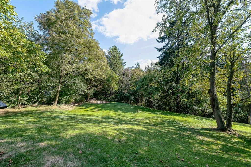31 Diebold Road McKees Rocks, PA 15136 - Photo 5 of 25 a backyard of a house with lots of green space
