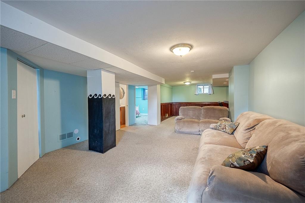 31 Diebold Road McKees Rocks, PA 15136 - Photo 9 of 25 a living room with furniture window and a refrigerator