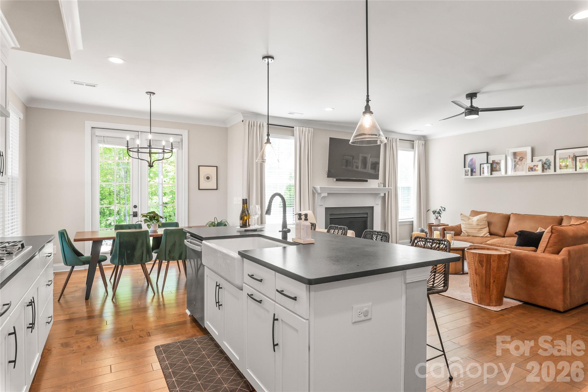 3213 Timber Run Lane Maiden, NC 28650 - Photo 19 of 47 a kitchen with center island table and chairs