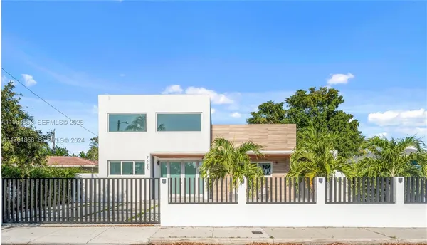 a living room with a garden and furniture