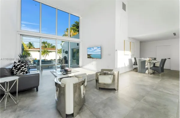 a view of kitchen with sink and breakfast area
