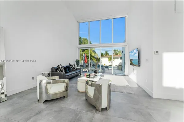 a room with sink washer and dryer