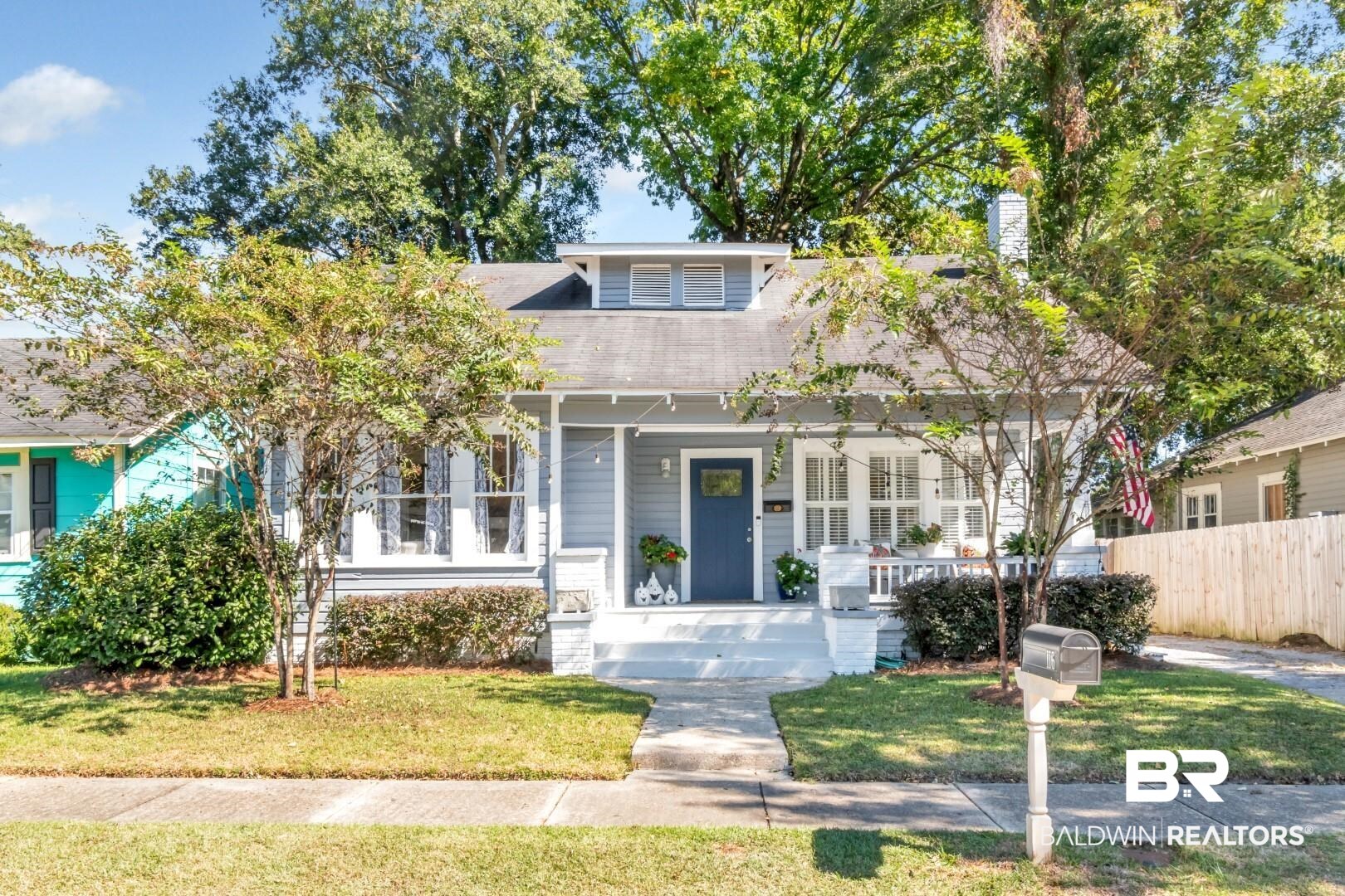 116 Item Avenue Mobile, AL 36607 - Photo 1 of 33 View of front of house with ceiling fan and a front yard