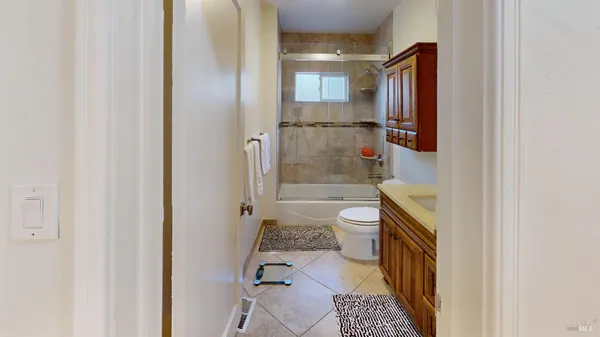 a bathroom with a sink and toilet
