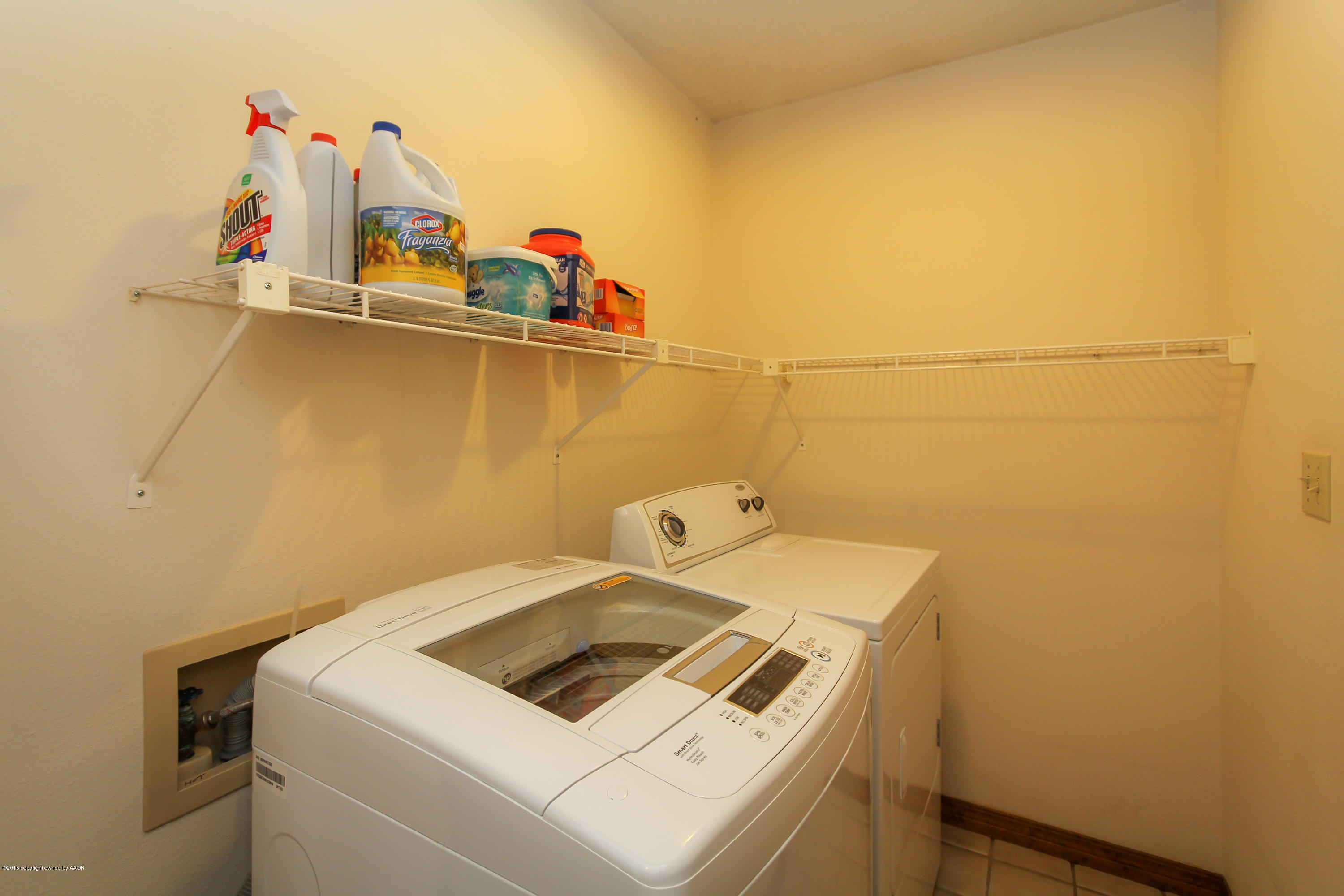 5102 Gary Lane Amarillo, TX 79110 - Photo 13 of 27 a utility room with dryer and washer